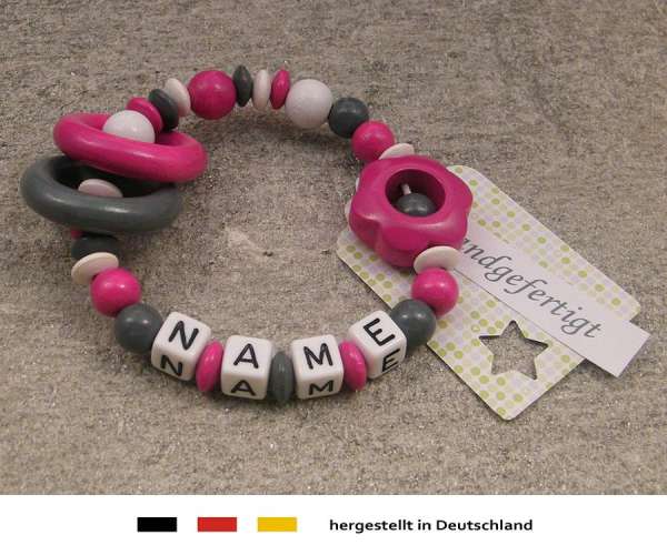 Greifling geschlossen mit Wunschnamen Motiv Blume in pink
